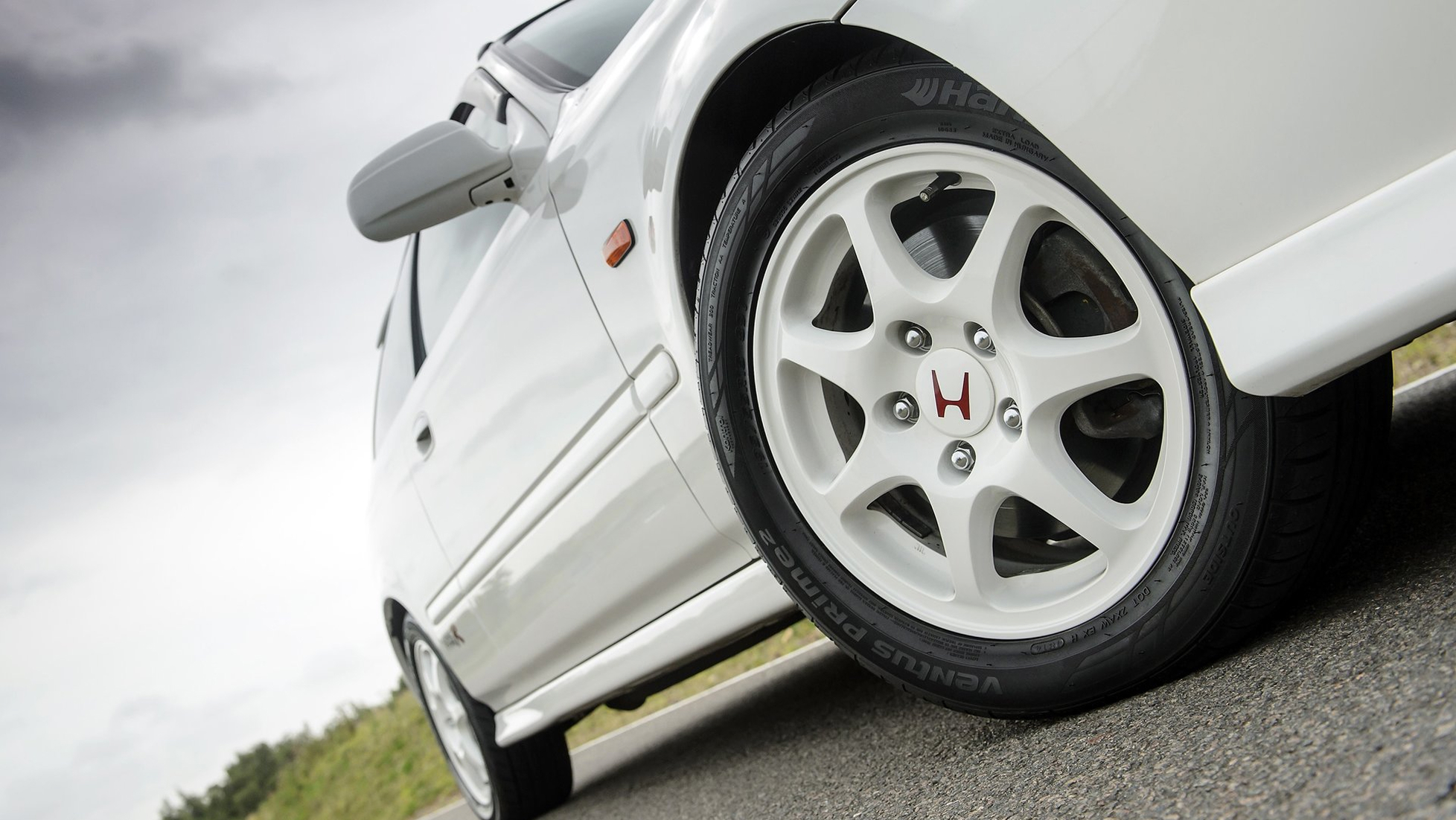 White Honda Civic EK9 Type R wheel and side profile detail with iconic Type R styling