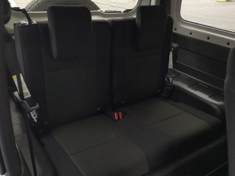 Suzuki Jimny Sierra rear seating area black interior